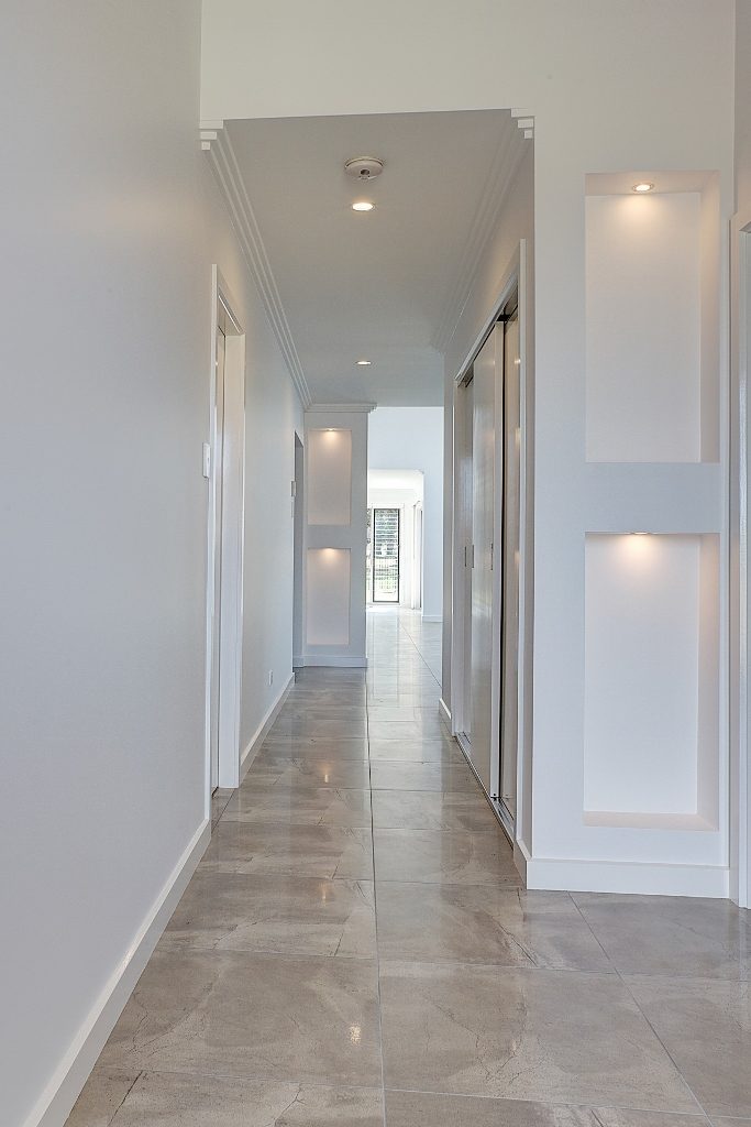White corridor with marble tiling